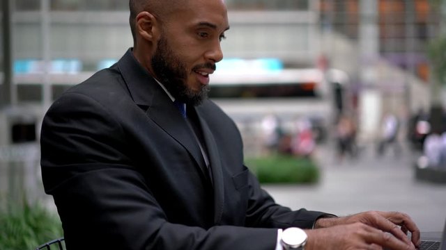 African American male financial director making international cell conversation for discussing corporate contract details, dark skinned boss calling for executive communication
