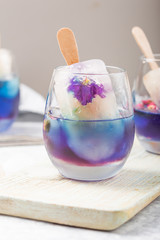 Cool herbal summer drink, Butterfly pea and lemongrass juice added. A beautiful color and tasty beverage cocktail.