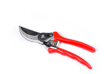 Isolated Pruning knives with red holder on white background.