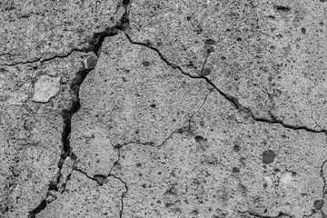 Abstract cement background. Cracked old concrete texture closeup.