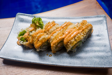 delicious and delicate dish of Japanese sushi rolls on beautiful slate set up in traditional healthy Asian food and creative oriental dining concept - Japan gourmet cuisine