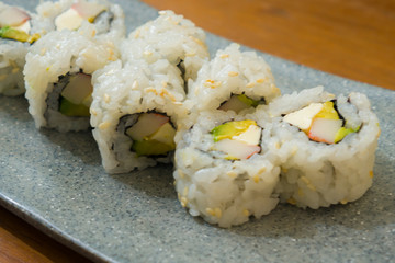 delicious and delicate dish of Japanese sushi rolls on beautiful slate set up in traditional healthy Asian food and creative oriental dining concept - Japan gourmet cuisine