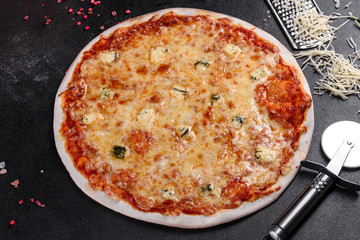 Delicious fresh oven cooked pizza four cheeses