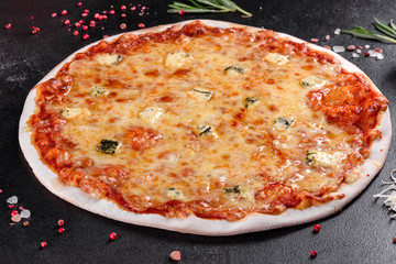 Delicious fresh oven cooked pizza four cheeses