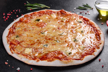 Delicious fresh oven cooked pizza four cheeses