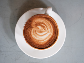 latte art coffee in a white cup