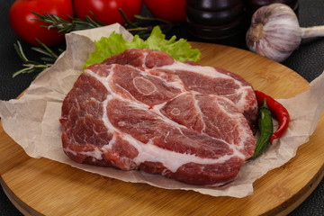 Raw pork neck steak