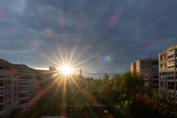Fototapeta premium Dawn View over housing in Madrid with Dramatic Sky