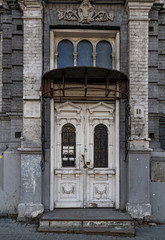 old church door. Grunge details of abandoned retro building. Architecture of Europe