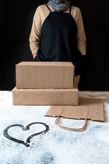 Worker delivery service packing bag box heart flour apron packer hand batch chef