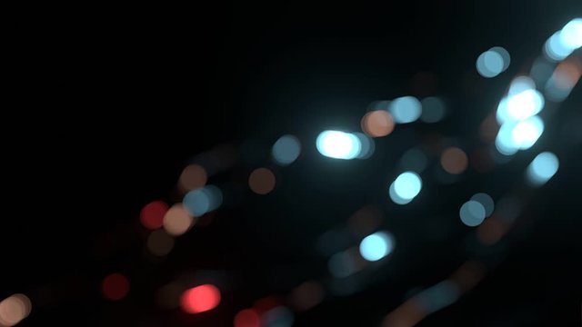 Colorful moving street lights with blur bokeh effect. Perfect CG seamless loop. For fvx overlay. 