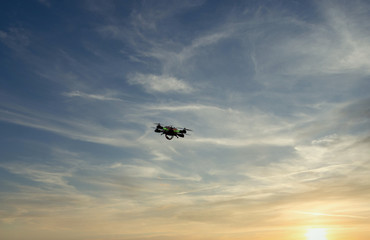 Fototapeta na wymiar drone flying against a blue sky in a marble quarry