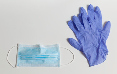 Protective kit with a surgical mask and a pair of gloves