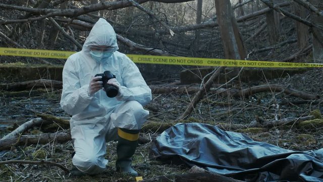 Detectives collecting evidence in a crime scene. Forensic specialists making expertise. Police officers and investigation.