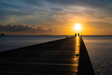 pier by the sea at sunset on the samui island
