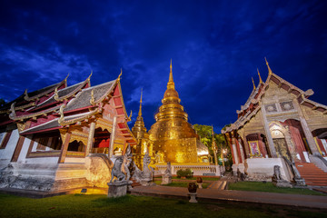 Fototapeta premium Wat phra singh temple twilight time in Chiang mai Thailand, Blue hour sky and Temple.