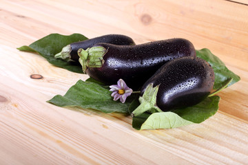 Aubergines on table