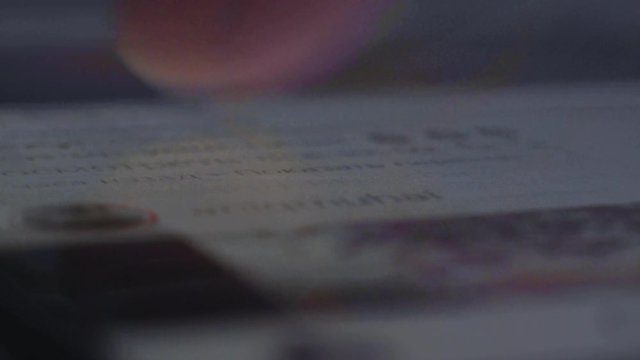 Finger quickly flips news feed in social network app on smartphone, looped. Person views new follower's posts. Blogger reads the publications of subscribers. Macro closeup shot. Current trends