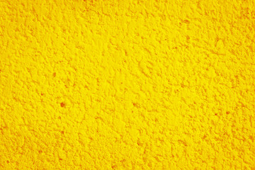 yellow concrete or cement material in abstract wall background texture.