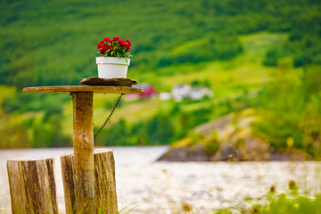 Rest stop area picnic table on fjord lake shore