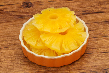 Marinated pineapple rings in the bowl