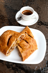 Apple strudel cut, cafe bakery concept.