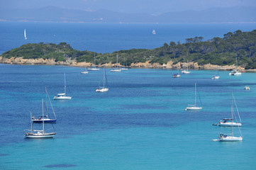 Fototapeta na wymiar Sails anchoring on the bank near french seashore
