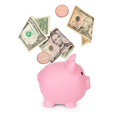 Piggy bank with US dollars isolated on white