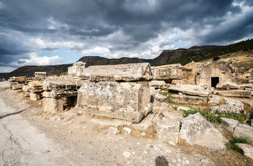 Fototapeta na wymiar Ruins of the largest antique necropolis in city Hierapolis in terrain of Turkey