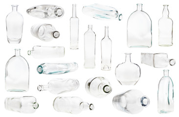 set of various empty clear bottles isolated