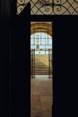 Backlit open door with illuminated background