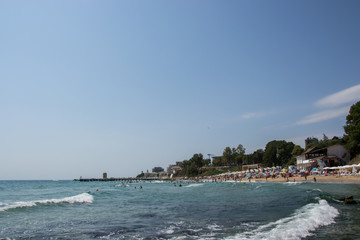 People enjoying the hot weather, beach fun  - human in the water, holiday destination, summertime relaxing at sea