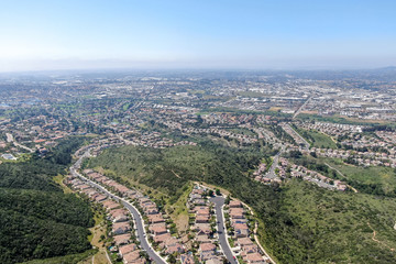 Aerial view of upper middle class neighborhood with big villas around Double Peak Park in San Marcos, California, USA.