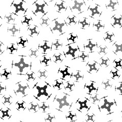Black Drone flying icon isolated seamless pattern on white background. Quadrocopter with video and photo camera symbol. Vector Illustration
