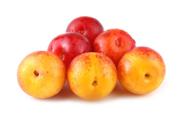 Plums isolated on white
