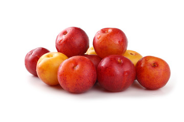 Plums isolated on white