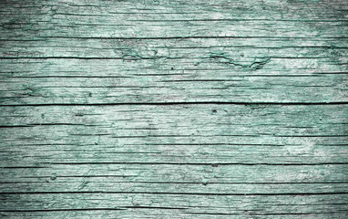 .green background of old dried board.