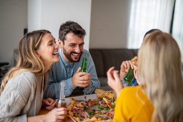 People sharing pizza