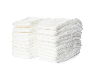 Stacks of baby diapers isolated on white