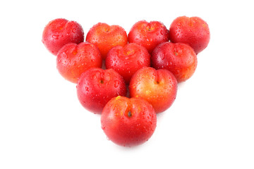 Plums isolated on white