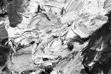 Fototapeta na wymiar black and white contrasting background of oil paints