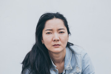 Fototapeta premium sad serious woman.depressed emotion panic attacks alone young people fear stressful.crying begging help.stop abusing domestic violence,person with health anxiety, bad frustrated exhausted feeling down