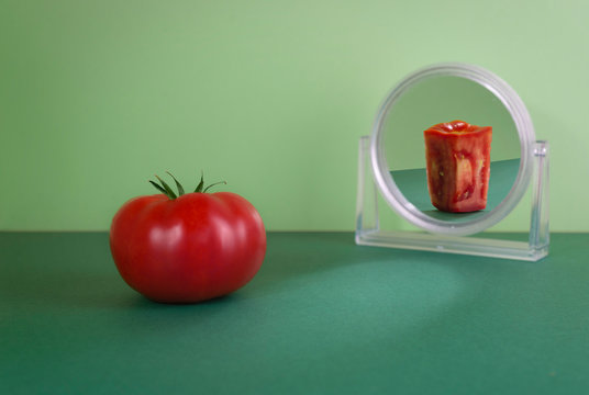 tomato mirror reflection. distorted self image