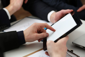Businessmen reading financial review at tablet pc in office. Stock market trade and investment, modern data search, use wifi connection, white collar partner, e-commerce profit, inspiration concept