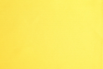 Texture of beautiful yellow fabric as background, closeup