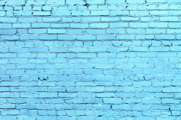 Old blue painted brick wall texture or background. High contrast and resolution image with place for text. Template for design