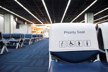 Empty seats at priority gate, airport seats