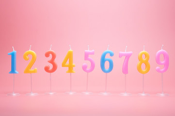 Set of Number 1 - 9 birthday celebration colorful on pastel pink background, Front view Blank for design copy space..
