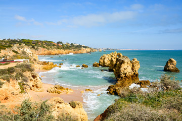 Fototapeta na wymiar Sunshine above Atlantic rocky coastline Algarve, Portugal. Picturesque seascape with white rocky cliffs, sea bay.Worm Bay along the Great Ocean Road.