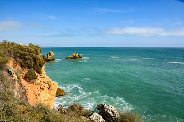 Sunshine above Atlantic rocky coastline Algarve, Portugal.
Picturesque seascape with white rocky cliffs, sea bay.Worm Bay along the Great Ocean Road.
